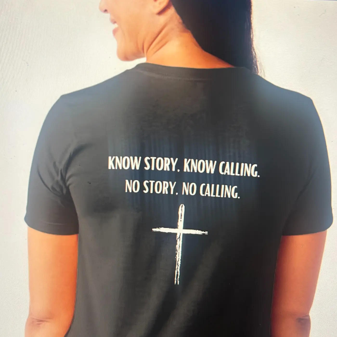 A shirt reading Know story, know calling; no story, no calling